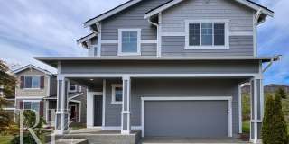 Warm & Inviting 4-Bedroom Home with Vaulted Ceilings, Loft, Fireplace & Fenced Backyard Gallery 1