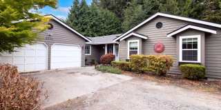Rare Secluded Puyallup Home on a Large Parcel | Fenced Yard & 2-Car Garage Gallery 1