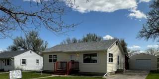 2 Bedroom House on West End with Oversized Single Car Garage and Covered Back Patio Gallery 1