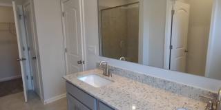 Beautiful Townhouse located in the McEwen Village! Gallery 9