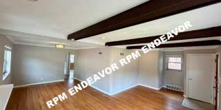 Spacious U-City Home with Finished Lower Level & 2 Car Garage Gallery 1
