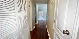 MOVE IN NOW!! Gated community Miriada! 1st floor 1X1.5 bath condo near pool area!!! Laminate wood flooring in living area and carpet in bedroom! Has washer & dryer! Gas stove & water heater! Gallery 29