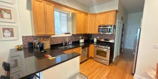 Beautifully updated & maintained 2 bed/2 bath Noble Square condo in an intimate 3 unit building. Gallery 6