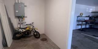 2 Bedroom 1 bath house with extra large double car garage and extra storage space! Gallery 29
