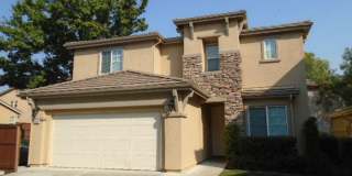 BEAUTIFUL WHITNEY OAKS HOME WITH 3+ BEDROOMS, 3 FULL BATHS,  2 CAR GARAGE! Gallery 1