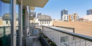 Gorgeous designer one bedroom in Hayes Valley w/lots of light, views, W/D, private patio, roof deck, gym and parking! Gallery 24