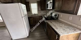 Updated and spacious 2 bedroom/1 bathroom house with detached 1 car garage. Gallery 4