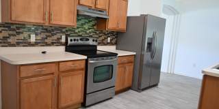 Large 4 bedroom home awaits your arrival! Gallery 8
