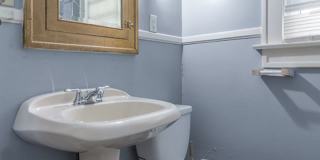 Charming 3BR Home with Classic Woodwork, Porch & Bonus Attic Space Gallery 14