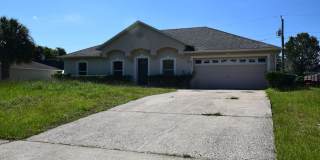This charming 4 Bedroom, 2 Bath Single Family Home For Rent at 3785 Trade St. Deltona, FL 32738 Gallery 1