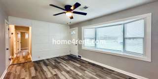 Lovely Three Bedroom Home in KCMO and an Updated Kitchen  w/ Granite and SS Appliances, including a Fenced Yard! Gallery 3