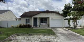 Charming 3BR/2BA Home in Boca Heights with Spacious Fenced Yard Gallery 1