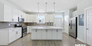 Oversized Kitchen + Prime Park Circle Location | 2BR Townhome Gallery 3