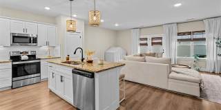 Like new modern maintenance free 3 bedroom 2.5 bath townhouse in Greensboro. Lawn care included. Gallery 4