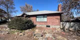 Bi-Level House w/ Massive Backyard, Storage, & Character! Gallery 3