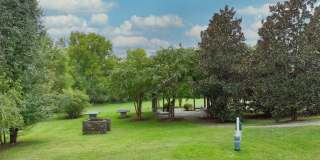**PRISTINE GARDEN-LEVEL CONDO ON THE FIRST LEVEL NEAR PAVILION AND COMMUNITY GREEN SPACE** Gallery 41