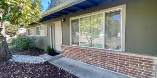 Lynnwood 3 bedroom 1.75 bath home with garage and fenced yard! $2750 per month Gallery 1