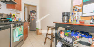 Beautifully updated 3 bed unit next to the Green Line in Allston. Gallery 1