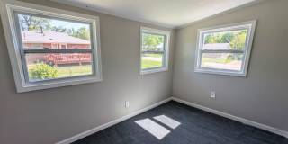 Updated Open-Concept with Sunroom & Finished Basement Space Gallery 9