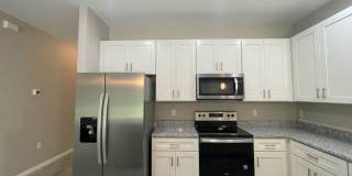 Nearly New Luxury 3-Bedroom Home with Designer Upgrades in Poinciana! Gallery 4