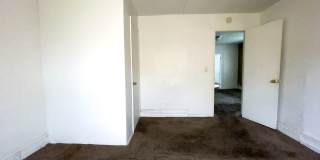 Fall into this cozy 3-Bedroom Home with a fenced in yard & detached garage! Gallery 16