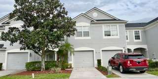 MOVE IN AUGUST! Beautiful 3 bed 2.5 bath townhome with large screened in back porch & 1 car attached garage!! In man gated Spring Isle/Avalon Park!! MOVE IN AUGUST! Beautiful 3 bed 2.5 bath townhome with large screened in back porch & 1 car attached garage!! In man gated Spring Isle/Avalon Park!! Gallery 1