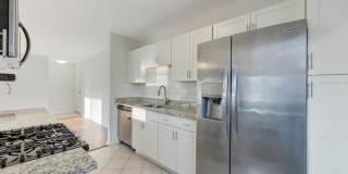 2Br/ 1Ba - Beautifully renovated first-floor walkout condo in water privileged community available now! Gallery 9