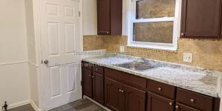 11620 Rossiter St is a 3-bedroom brick bungalow for rent in Detroit's Denby neighborhood for $1,250/month — Section 8 and Housing Choice Vouchers welcome, steps from Brookins Park in 48224. Gallery 10