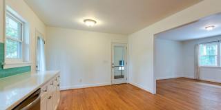 Discover the epitome of stylish living in this meticulously updated mid-century brick ranch, now available for rent. Gallery 15