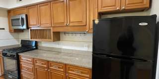 Charming 1928 Row Home for Rent with Modern Amenities — 3 Bedroom 2 Full Bath w/ 2 Half Baths, 2 Kitchens, located in Kingman Park, Near DC Armory & Eastern Market Gallery 23