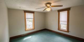Bright, beautiful home with 3 garage spaces & tons of storage! Gallery 17