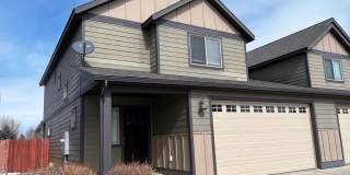 3-Bedroom Townhome with Double Garage & Private Fenced Yard Gallery 1