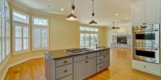 Stunning two-story spacious home on tranquil tree-lined street. Gallery 28