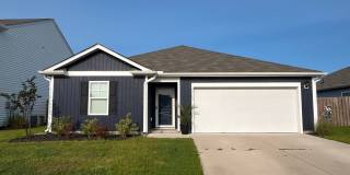 Discover a well-appointed 3-bedroom, 2-bath home in Leland, NC Gallery 1