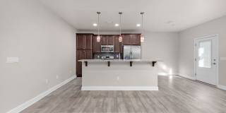 Welcome home to this beautifully maintained townhome in Mossy Oak Village. Gallery 14