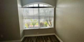 RESERVE AT WEDGEFIELD 3 bedroom 2 bath home with stainless appliances, laminate flooring and a fenced back  yard! Gallery 5