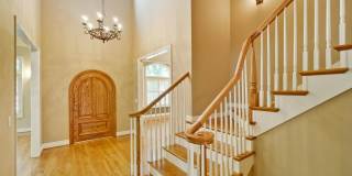 Stunning two-story spacious home on tranquil tree-lined street. Gallery 10
