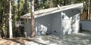 Quite location and mountain cabin feel at 27125 Lake Dr. in Pioneer. Gallery 1