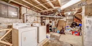 Charming 5-Bedroom Home with Exposed Brick and Modern Upgrades Gallery 48