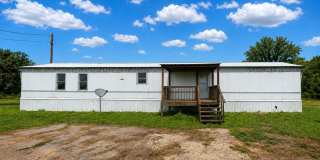 A DEER HUNTER'S DREAM with EXPANSIVE 10.41-acre lot - with 3 beds/ 2bath available now!!! Gallery 1