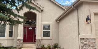 Stunning 5 Bedroom Walk-Out Ranch Style Home with Pikes Peak Views Stunning 5 Bedroom Walk-Out Ranch Style Home with Pikes Peak Views Gallery 1