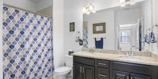 Like new gorgeous ground level Condo with Detached Garage and open floor plan. Gallery 21