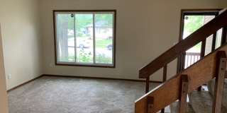 2 BR, 1.5 BA Clive split level duplex.  Deck and one car attached garage. Gallery 7