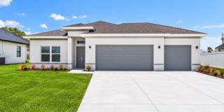 BRAND-NEW 4-Bedroom Canal-Front Home in Cape Coral – 3-Car Garage & Luxury Upgrades! BRAND-NEW 4-Bedroom Canal-Front Home in Cape Coral – 3-Car Garage & Luxury Upgrades! Gallery 1