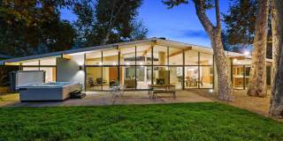 Classic Malibu Mid-Century Modern design meets effortless indoor-outdoor living in the coveted Malibu West community! Classic Malibu Mid-Century Modern design meets effortless indoor-outdoor living in the coveted Malibu West community! Gallery 1