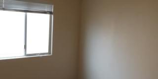Huge family room with kitchen nicely tucked in the middle. Gallery 7