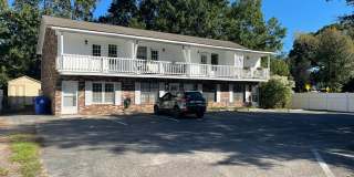 Available March 16th. Water included. RENOVATED 2 BR/1.5 BA Townhouse in the Heart of James Island! Gallery 1