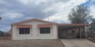 Charming 3-Bedroom Home with Oversized Garage in Holiday Shores and PETS WELCOME Gallery 1