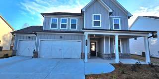 Incredible Farmhouse Style Home with Three Car Garage Gallery 1