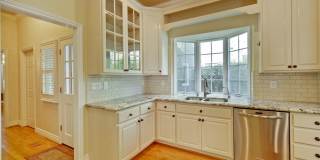 Stunning two-story spacious home on tranquil tree-lined street. Gallery 25